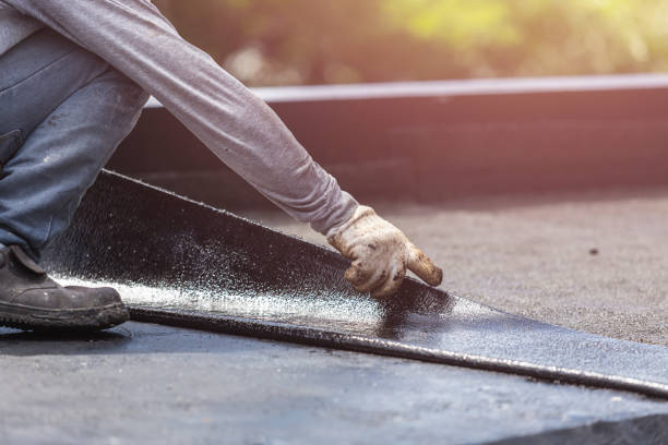 Professional Basement Waterproofing technician working in Corfu, NY